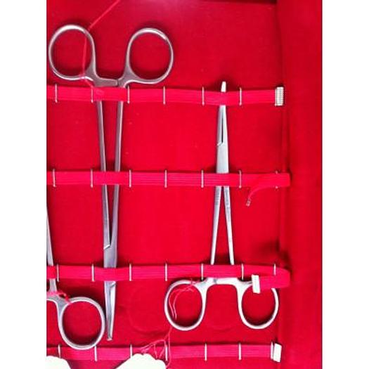 TEKNO BRAND SURGICAL INSTRUMENTS IN LEATHER POUCH