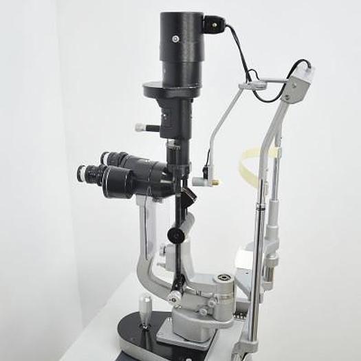 Used HAAG STREIT BM 900 SLIT LAMP ON HEIGHT-ADJUSTABLE TABLE