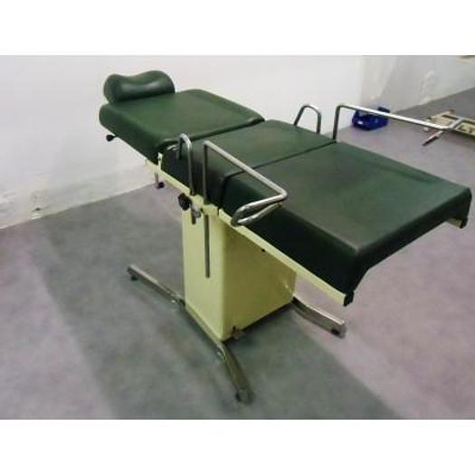 Used GYNECOLOGICAL EXAMINATION COUCH WITH STIRRUPS, HEADREST AND COLPOSCOPE HOLDER
