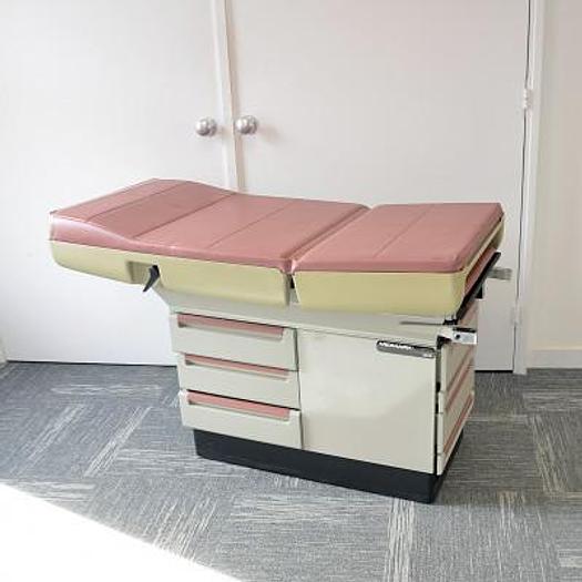 Used MIDMARK PROMOTAL 404 EXAMINATION TABLE WITH DRAWERS AND STIRRUPS