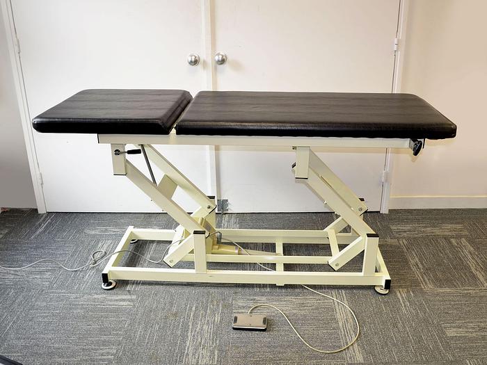 Used HENNING ELECTRIC EXAMINATION COUCH WITH TILTING HEADREST