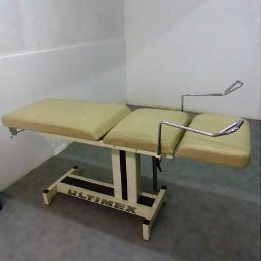 Used ULTIMEX GYNECOLOGICAL EXAMINATION COUCH WITH STIRRUPS, ADJUSTABLE LEG PLATE AND COLPOSCOPE HOLDER