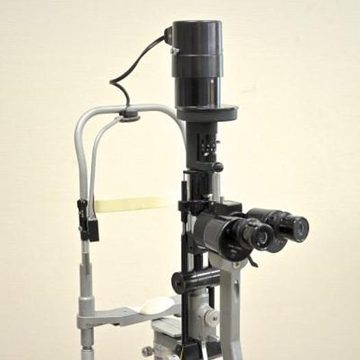 Used HAAG STREIT 900 SLIT LAMP ON HEIGHT-ADJUSTABLE TABLE