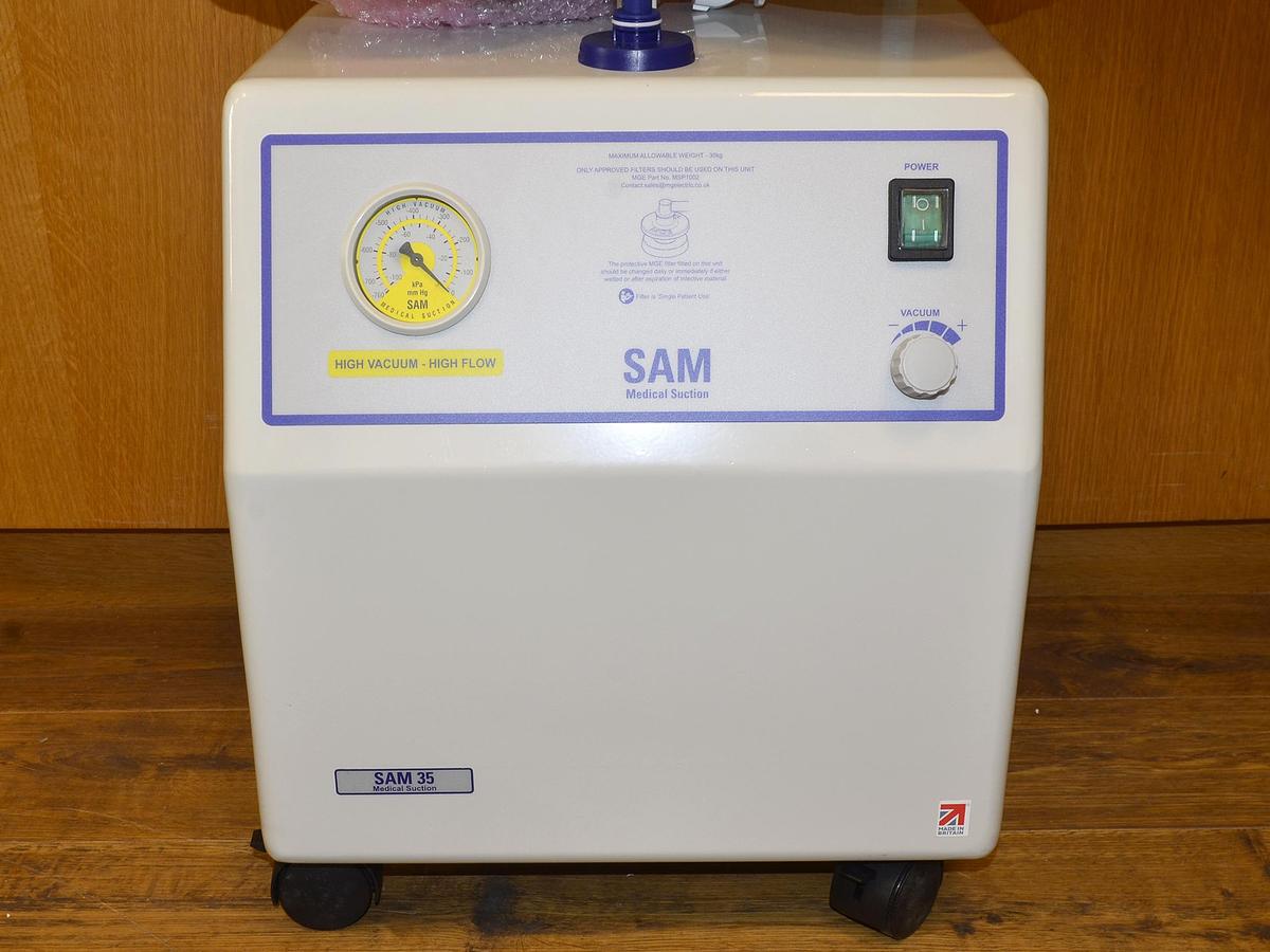MGE SAM 35 NEW SURGICAL ASPIRATOR with pedal, 2 4-litre jars, consumable