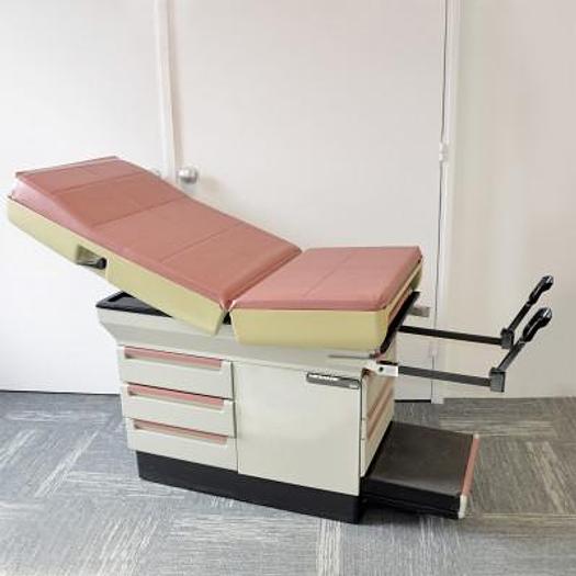 Used MIDMARK PROMOTAL 404 EXAMINATION TABLE WITH DRAWERS AND STIRRUPS