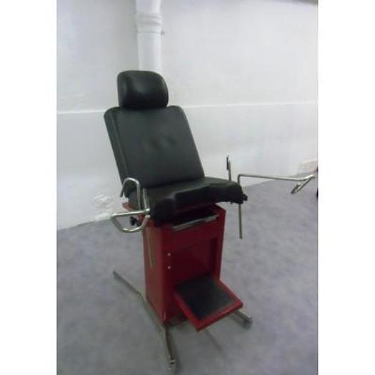 Used GYNECOLOGICAL EXAMINATION COUCH WITH HEADREST, STIRRUPS, FOOTBOARD AND STAINLESS STEEL DRAWER