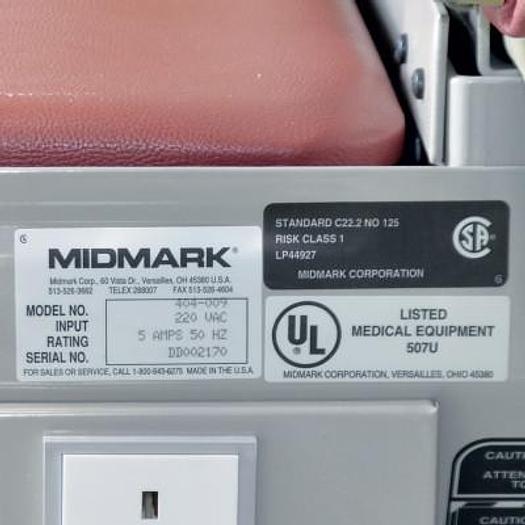 Used MIDMARK PROMOTAL 404 EXAMINATION TABLE WITH DRAWERS AND STIRRUPS