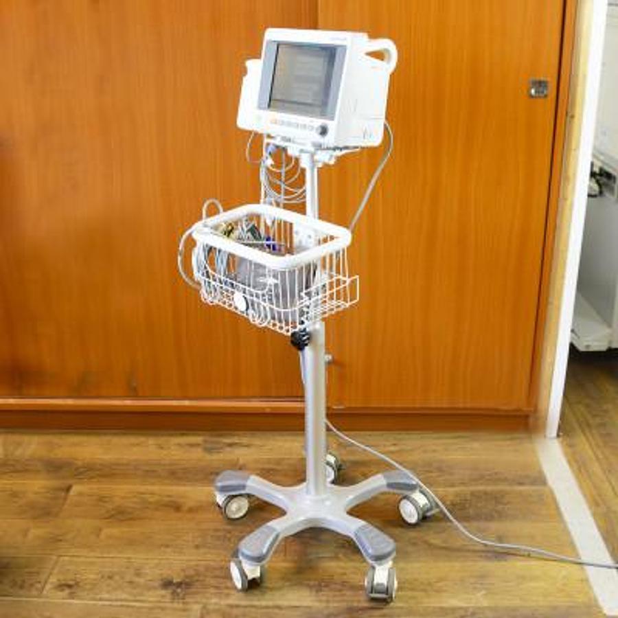 Used EDAN iM50 MULTIPARAMETER MONITORING SYSTEM (ECG, NIBP, SPO2, RESP, WITH CO2 CAPNOGRAPHY) ON ITS ROLLING TROLLEY.