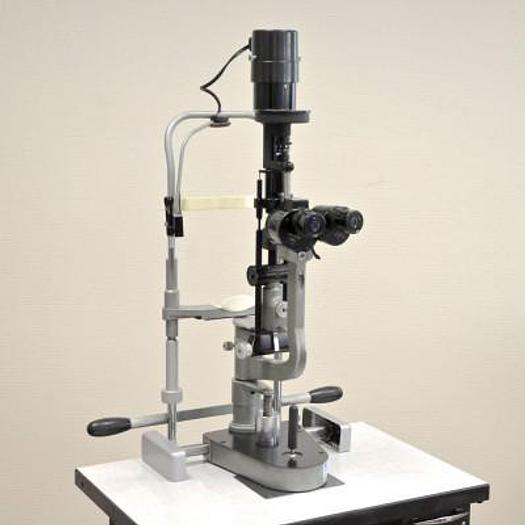 Used HAAG STREIT 900 SLIT LAMP ON HEIGHT-ADJUSTABLE TABLE