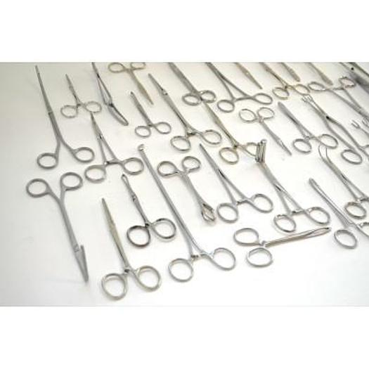 Used ALUMINUM BOX WITH GYNECO INSTRUMENTS AND PLIERS