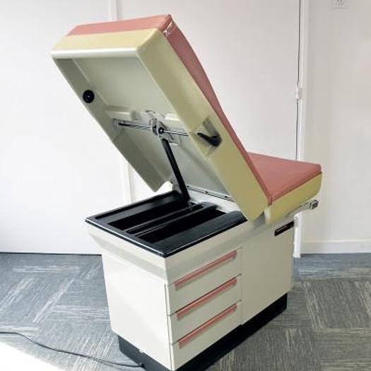 Used MIDMARK PROMOTAL 404 EXAMINATION TABLE WITH DRAWERS AND STIRRUPS