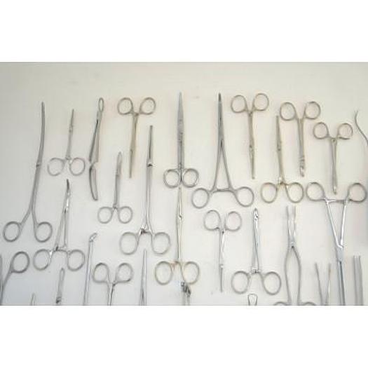 Used ALUMINUM BOX WITH GYNECO INSTRUMENTS AND PLIERS