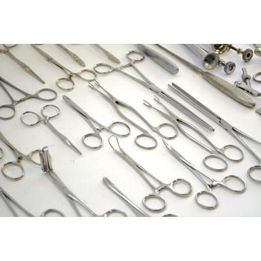 Used ALUMINUM BOX WITH GYNECO INSTRUMENTS AND PLIERS