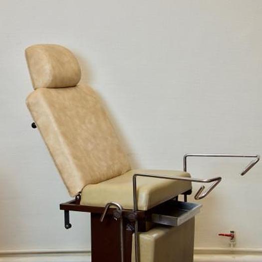 Used GYNECOLOGICAL EXAMINATION COUCH WITH STIRRUPS AND HEADREST