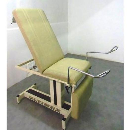 Used ULTIMEX GYNECOLOGICAL EXAMINATION COUCH WITH STIRRUPS, ADJUSTABLE LEG PLATE AND COLPOSCOPE HOLDER