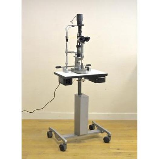 Used HAAG STREIT 900 SLIT LAMP ON HEIGHT-ADJUSTABLE TABLE