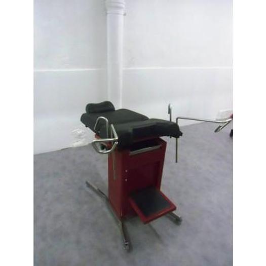 Used GYNECOLOGICAL EXAMINATION COUCH WITH HEADREST, STIRRUPS, FOOTBOARD AND STAINLESS STEEL DRAWER