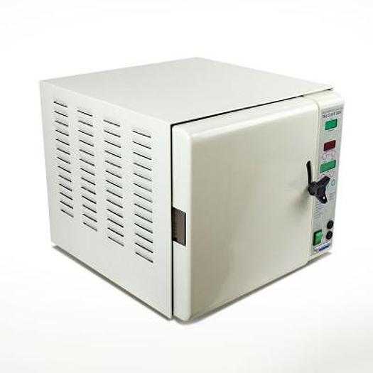 Used TAU CLAVE 3000 AUTOCLAVE WITH VACUUM PUMP