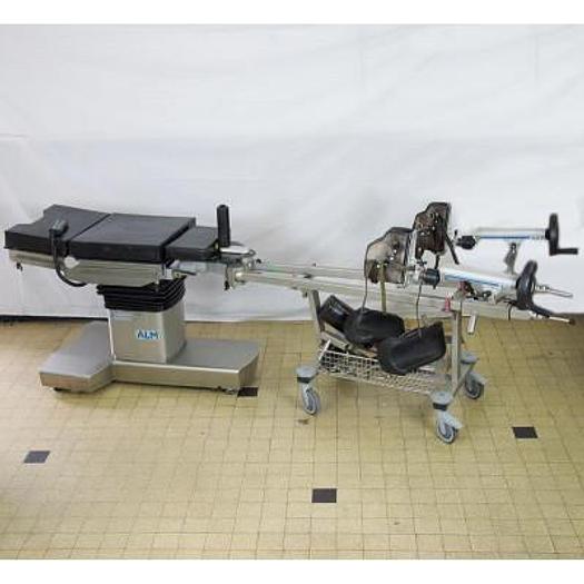 Used ALM 6090 ELECTRIC OPERATING TABLE WITH REMOTE CONTROL, CHARGER AND ORTHOPEDIC EXTENSION
