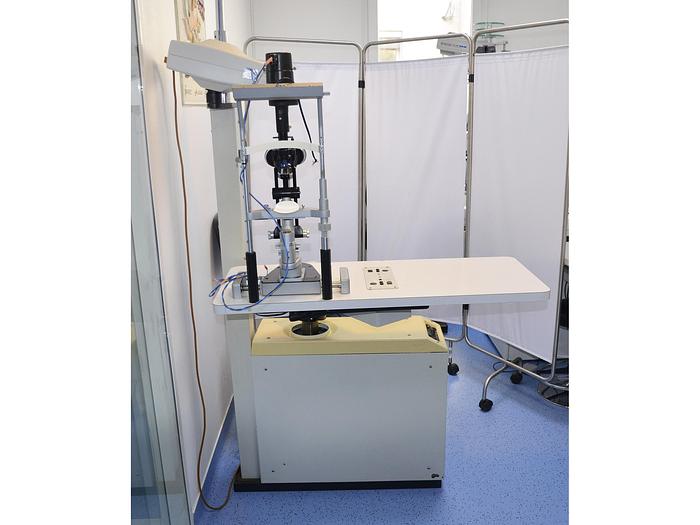 D'occasion LAMPE A FENTE HAAG STREIT 900 SUR SA TABLE ET SON SIEGE A HAUTEUR VARIABLE ELECTRIQUE