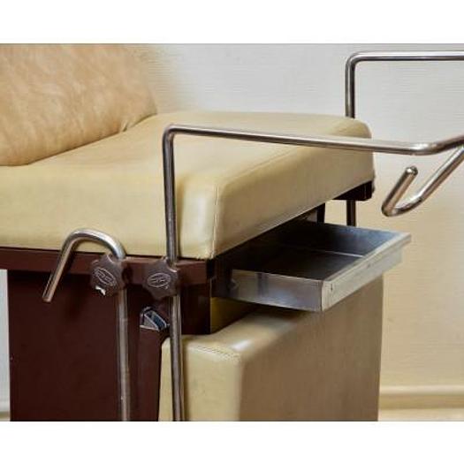 Used GYNECOLOGICAL EXAMINATION COUCH WITH STIRRUPS AND HEADREST