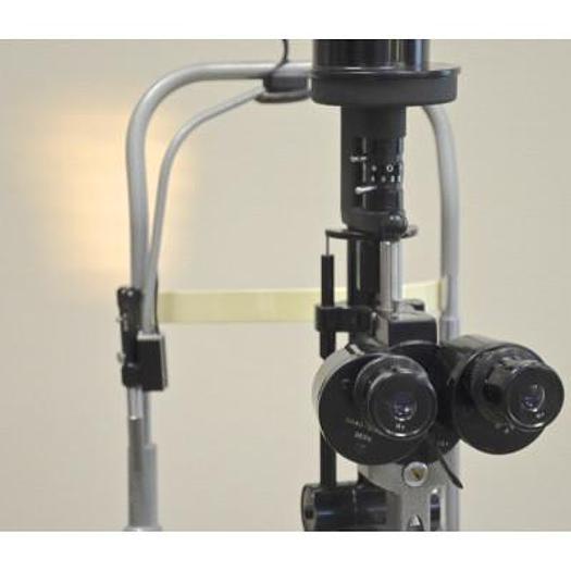 Used HAAG STREIT 900 SLIT LAMP ON HEIGHT-ADJUSTABLE TABLE