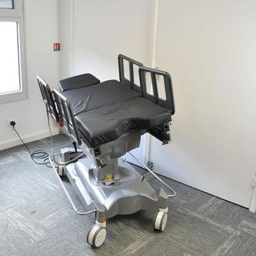 Used ANETIC AID QA4 UNIVERSAL ELECTRIC MOBILE SURGICAL TABLE