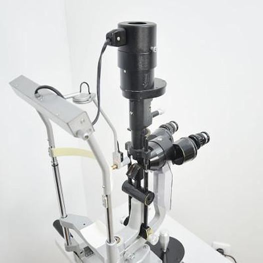 Used HAAG STREIT BM 900 SLIT LAMP ON HEIGHT-ADJUSTABLE TABLE