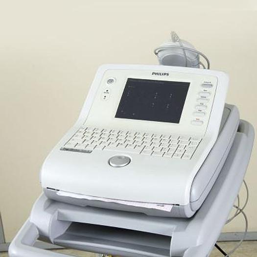 Used PHILIPS TRIM II 12-CHANNEL ECG ON CART. 50 ECG MEMORIES AND DATA TRANSFER TO NETWORK