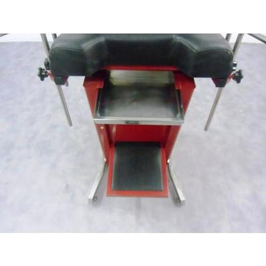 Used GYNECOLOGICAL EXAMINATION COUCH WITH HEADREST, STIRRUPS, FOOTBOARD AND STAINLESS STEEL DRAWER
