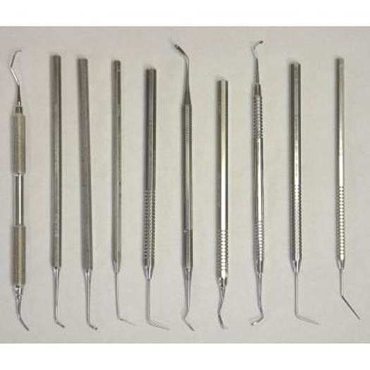 Used BOX WITH DENTAL INSTRUMENTS