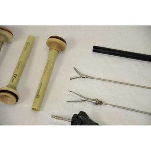 Used SET OF TROCARDS AND TROCAR SHEATHS AND 2 INSERTS