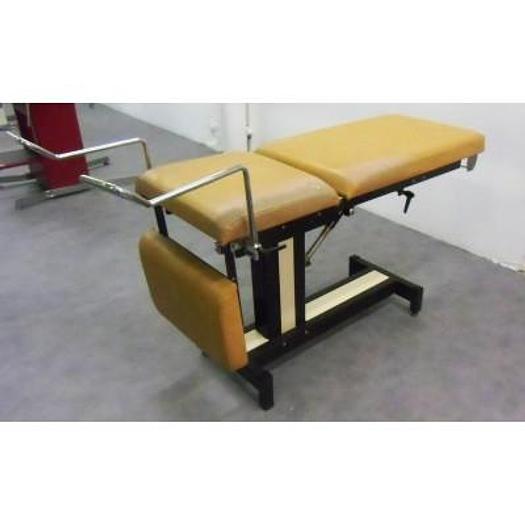 Used GYNECOLOGICAL EXAMINATION COUCH WITH STIRRUPS AND ADJUSTABLE LEG PLATE