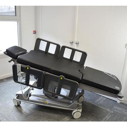 Used ANETIC AID QA4 UNIVERSAL ELECTRIC MOBILE SURGICAL TABLE