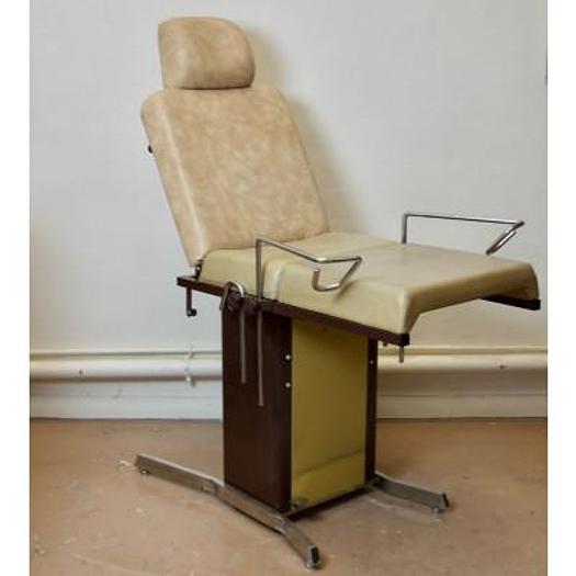 Used GYNECOLOGICAL EXAMINATION COUCH WITH STIRRUPS AND HEADREST