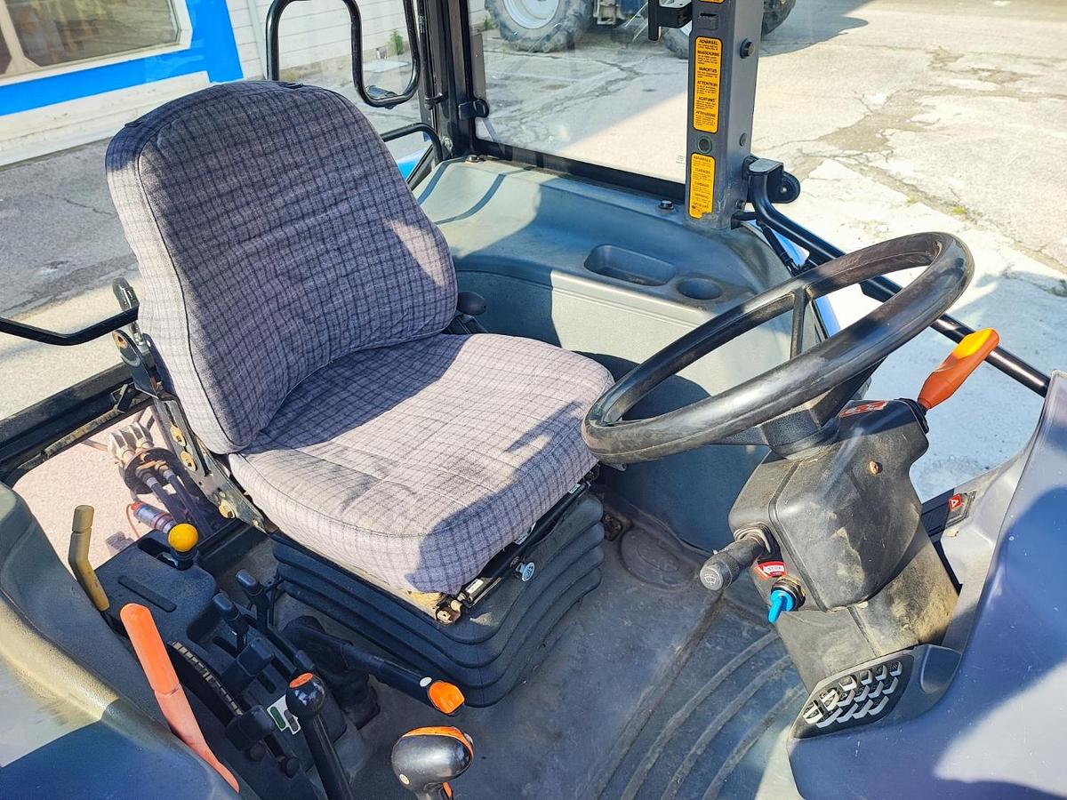 Usato New Holland TLA 100-fr.aria-4500 ore