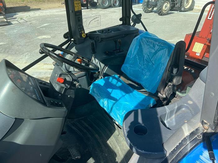 Usato New Holland TS 100 anno 2004 ore 6200 con caricatore