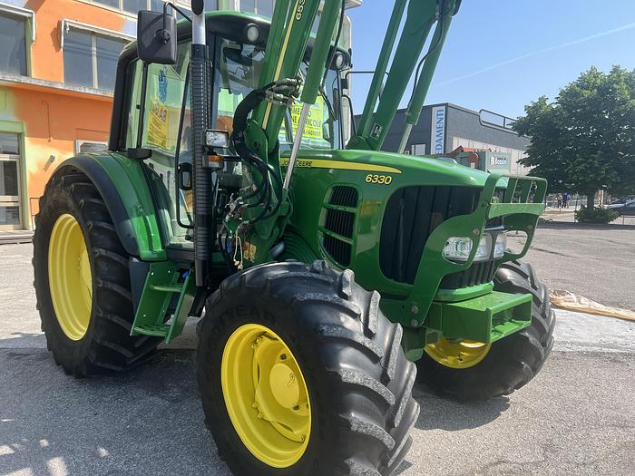 Usato John Deere 6330 caricat.JD 653-ore 4411-anno 2009