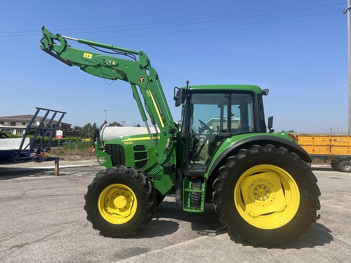 Usato John Deere 6330 caricat.JD 653-ore 4411-anno 2009