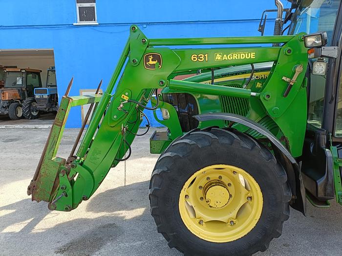 Usato Caricatore originale John Deere 631 con forche