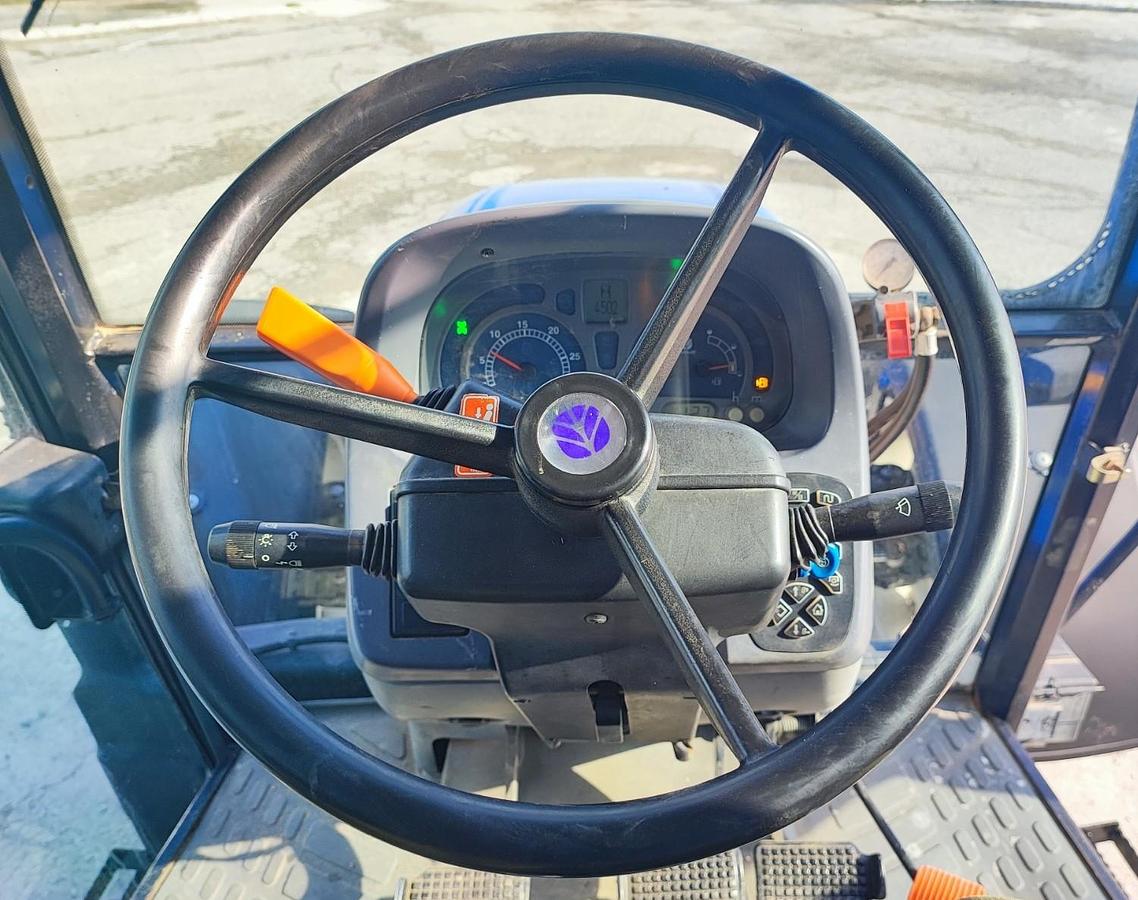 Usato New Holland TLA 100-fr.aria-4500 ore