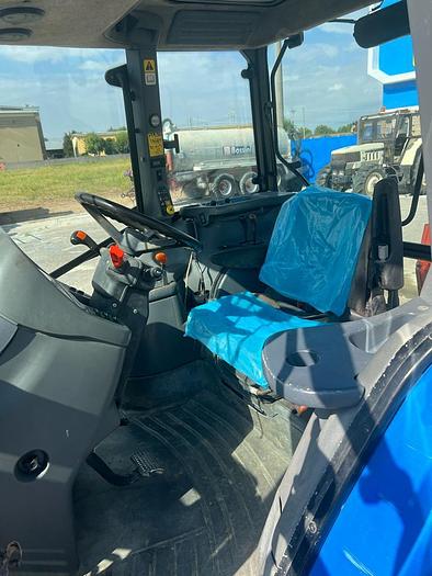 Usato New Holland TS 100 anno 2004 ore 6200 con caricatore