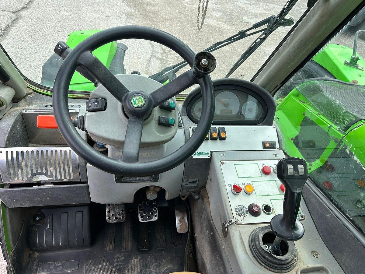 Usato telescopico Merlo P 28.6 con forche da bancali