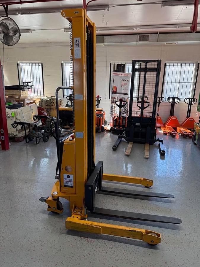 Used Like new ULINE Semi electric 2,200lbs capacity straddle stacker