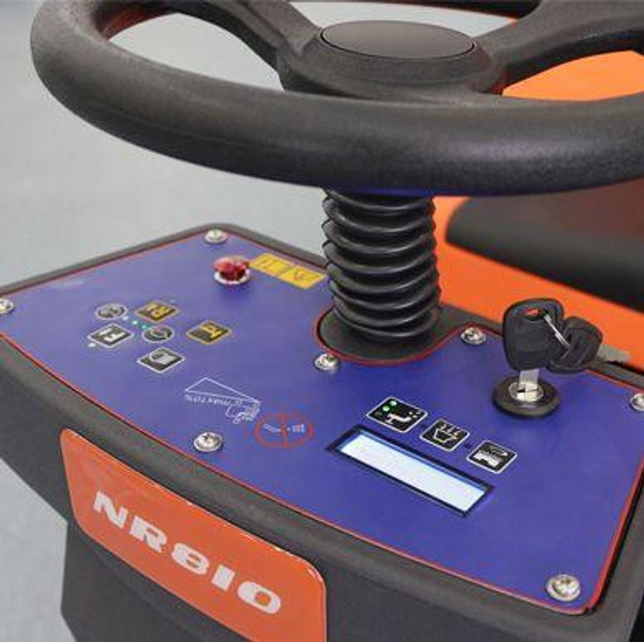 Ride-on electric industrial scrubber - Large sized spaces - 60,000 sq feet/hour.