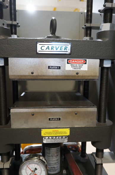 Used Carver 4122 manual 4 post heated press, 12 Ton capacity