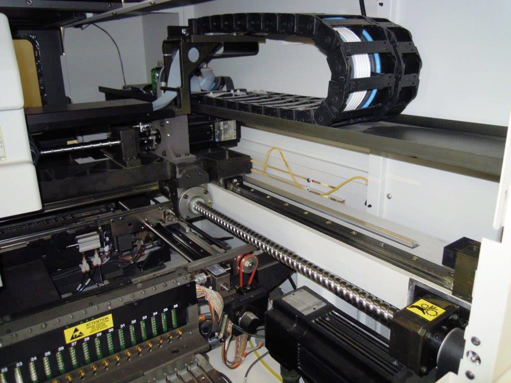 Used Universal Advantis AC72 chip placer