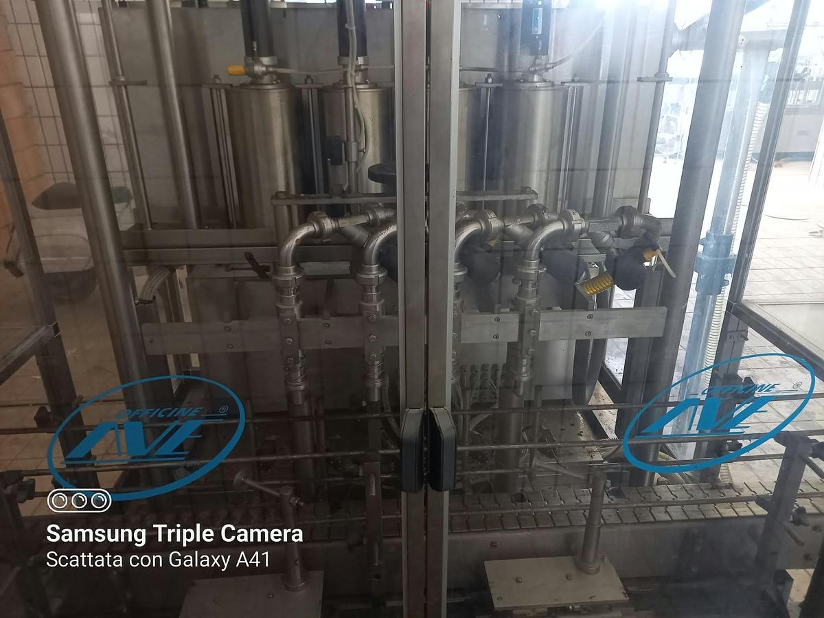 Usato 2001 Linea di Imbottigliamento olio/vino AVE Industries RV-4 - Liquid Packaging Equipment / Universal Filling Lines