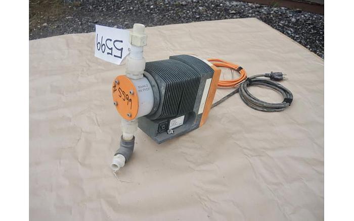 Used USED METERING PUMP, 4.5 USG/HOUR, 58 PSI