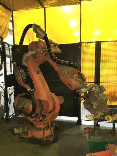 Used ABB IRBP C-1000 SPOT WELDING CELL WITH TWO ABB IRB 6640 180/2.55 ROBOTS & IRC 5 CONTROLLERS & ARO SERVO SPOT WELD GUNS